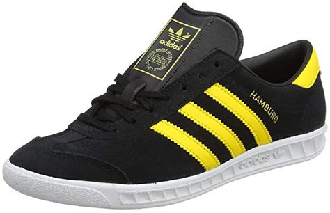 adidas schwarze schuhe gelbe sohle|Gelbe Sneakers .